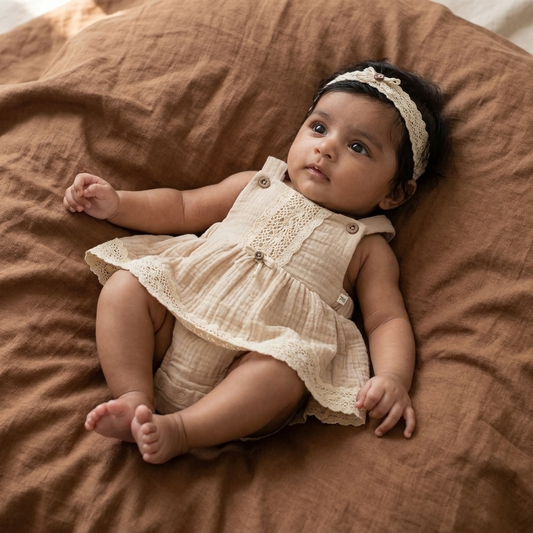 The Breezy Button Onesie